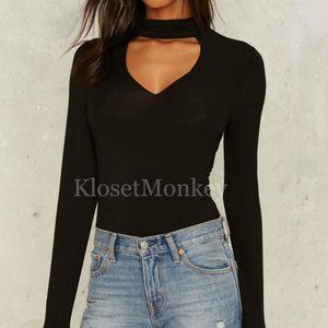 Long sleeved, form fitting, v neck halter top